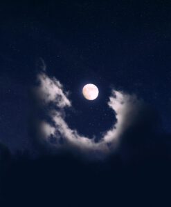 full moon covered by clouds
